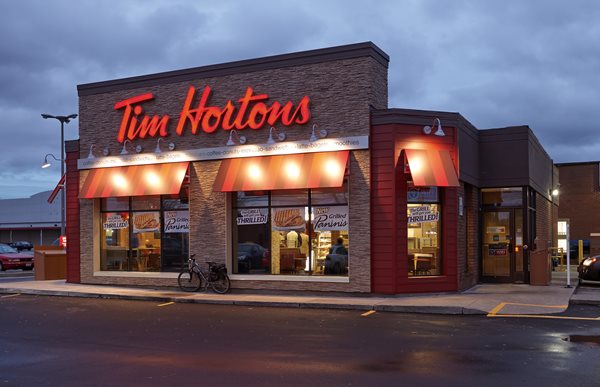 Tim Hortons gains ground globally but closes stores in Canada